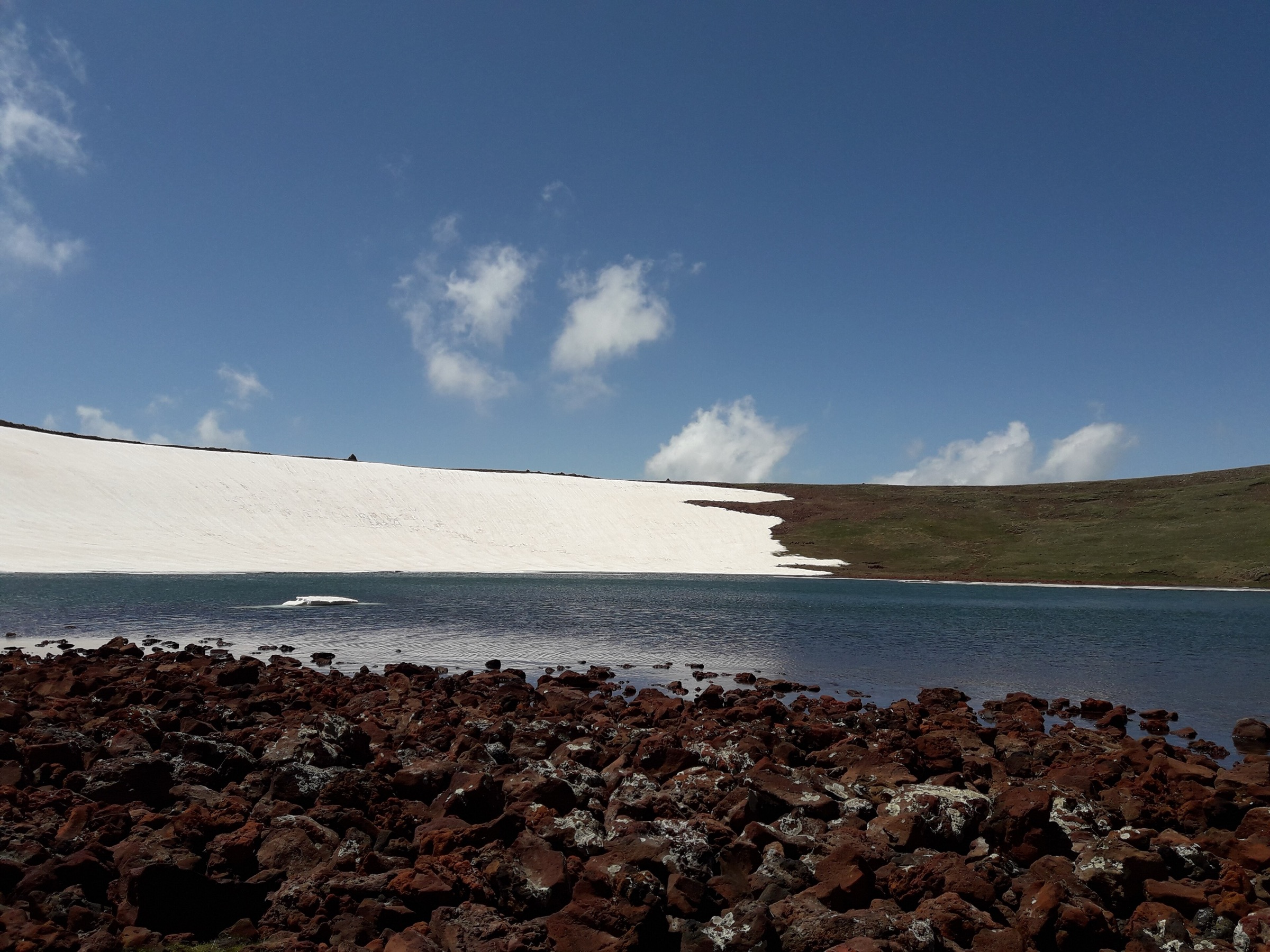 Crater lake at the summit of Mount Azhdahak in the Geghama Mountains