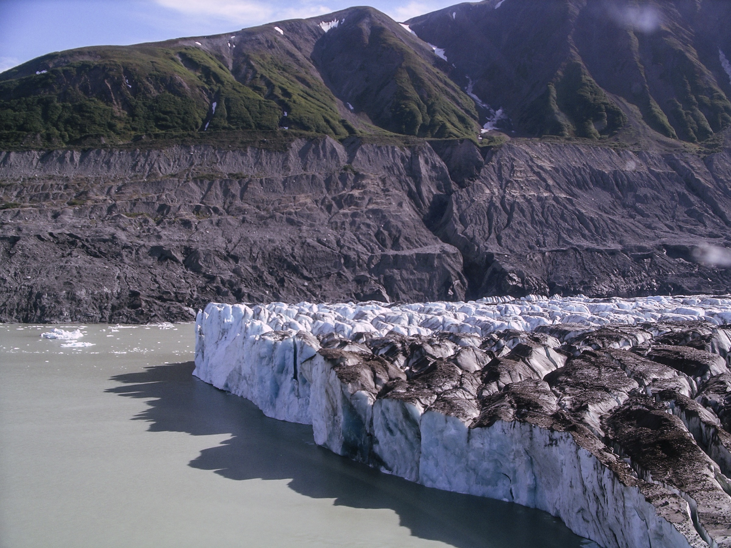 Lowell Glacier calving into Lowell Lake on the Alsek River, the classic view from Goatherd Mountain