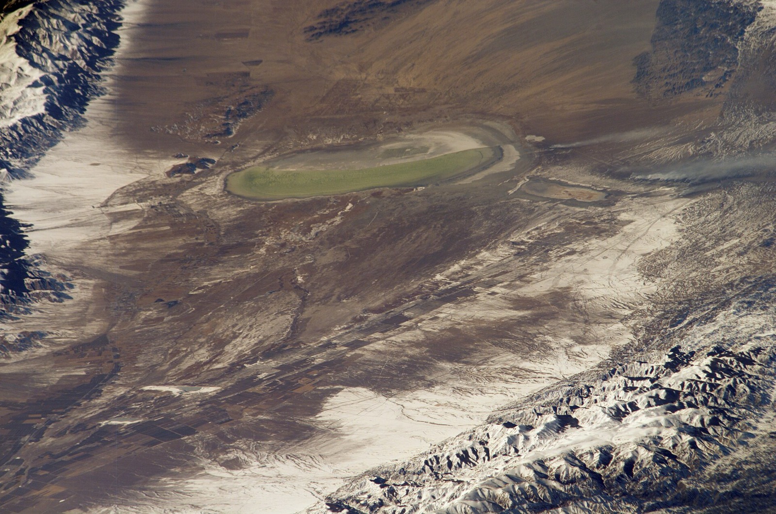 Barkol Lake area with snow and mountains, photographed from the ISS