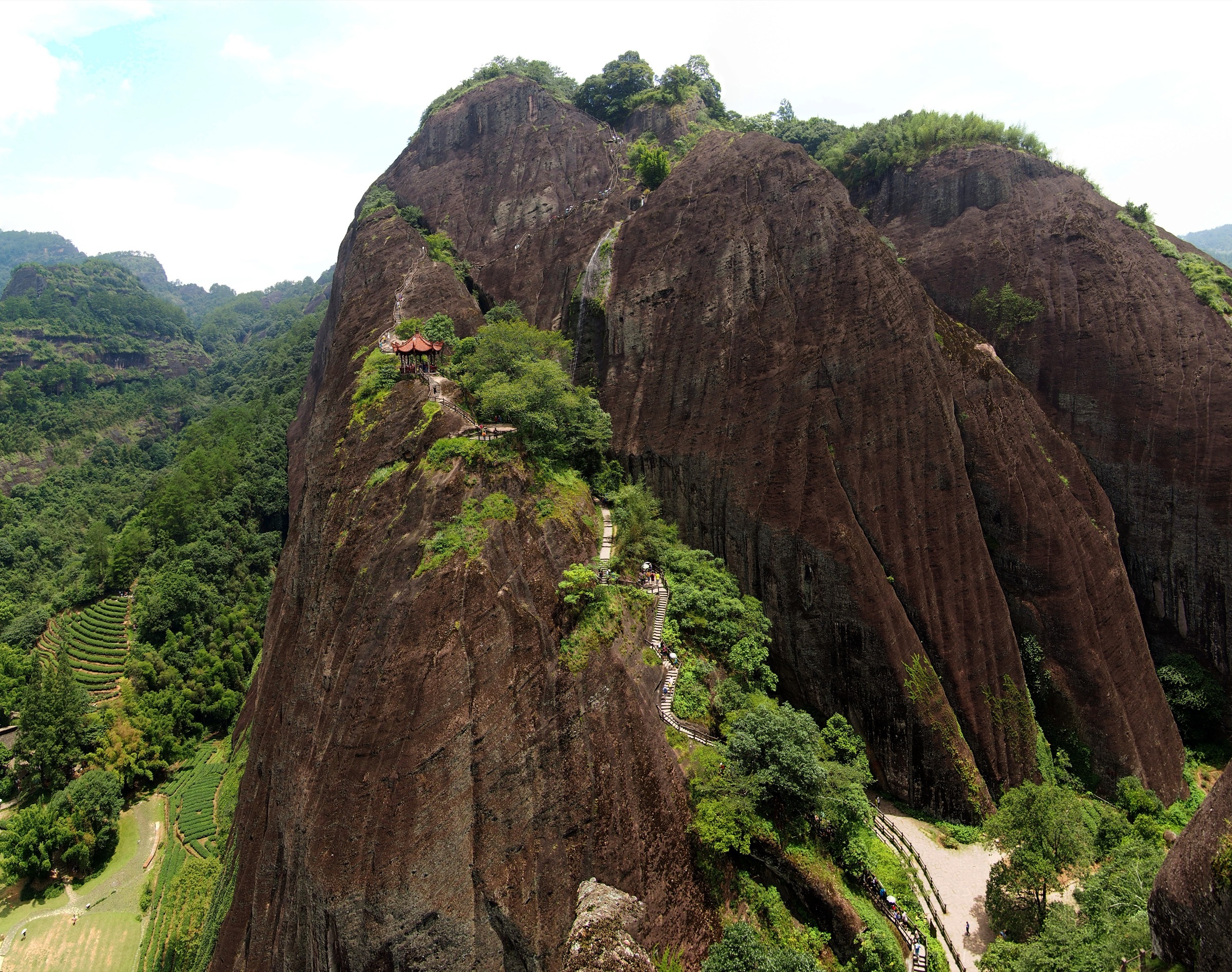 Tianyou Peak rising above the fifth bend of the Jiuqu Brook in the Wuyi Mountains