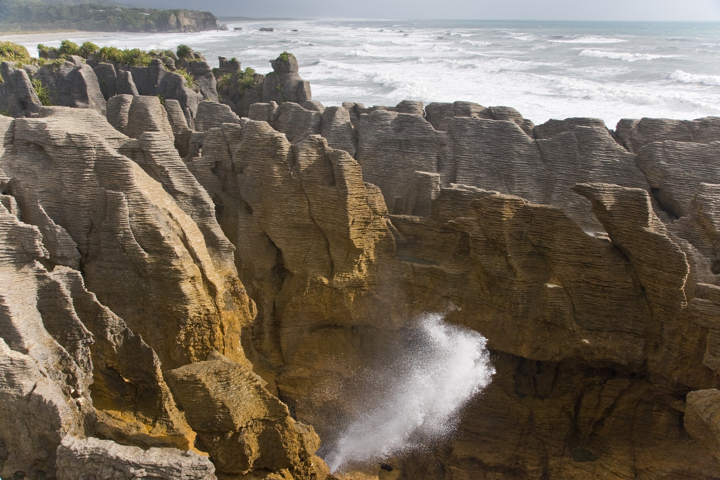Pancake Rocks limestone stacks and surge pools at Dolomite Point, Punakaiki, West Coast, New Zealand