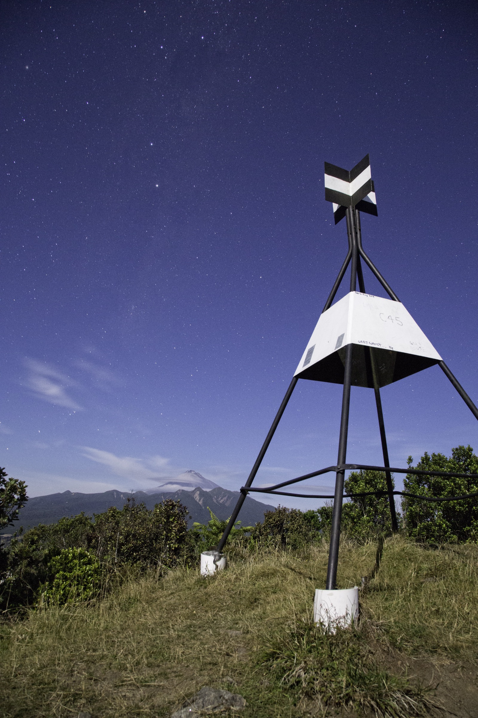 Star trails and moonlight above Patuhā Trig on the Kaitake Range