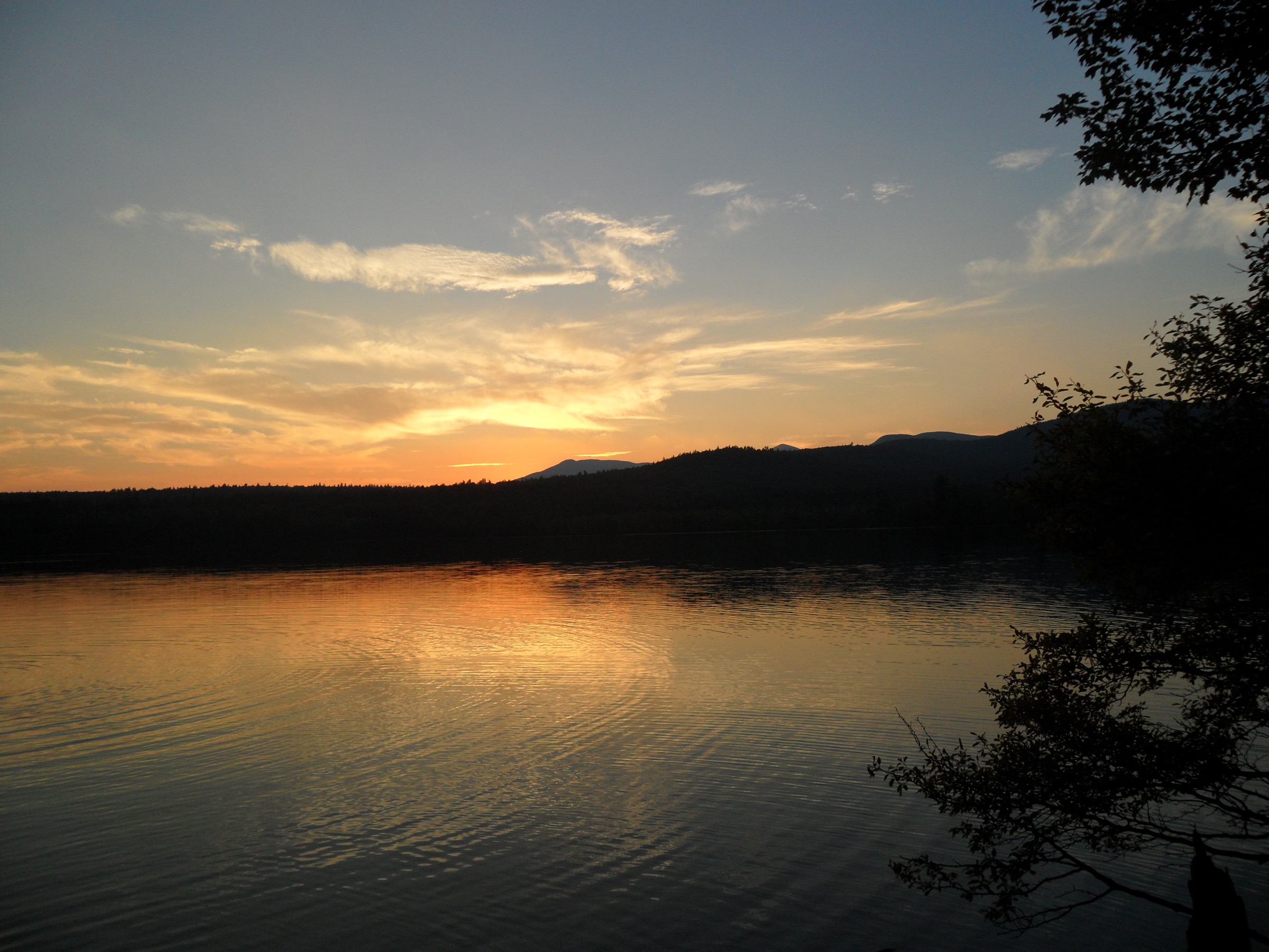 Mount Chocorua pyramid summit above Chocorua Lake at sunset