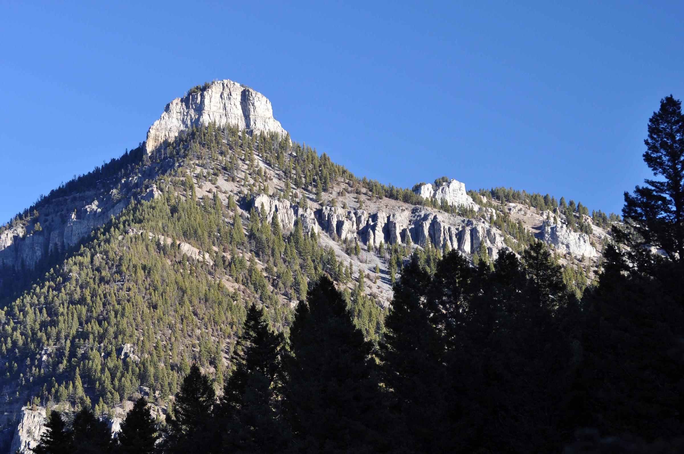 Storm Castle Peak rising above Gallatin Canyon in the western Gallatin Range, Montana