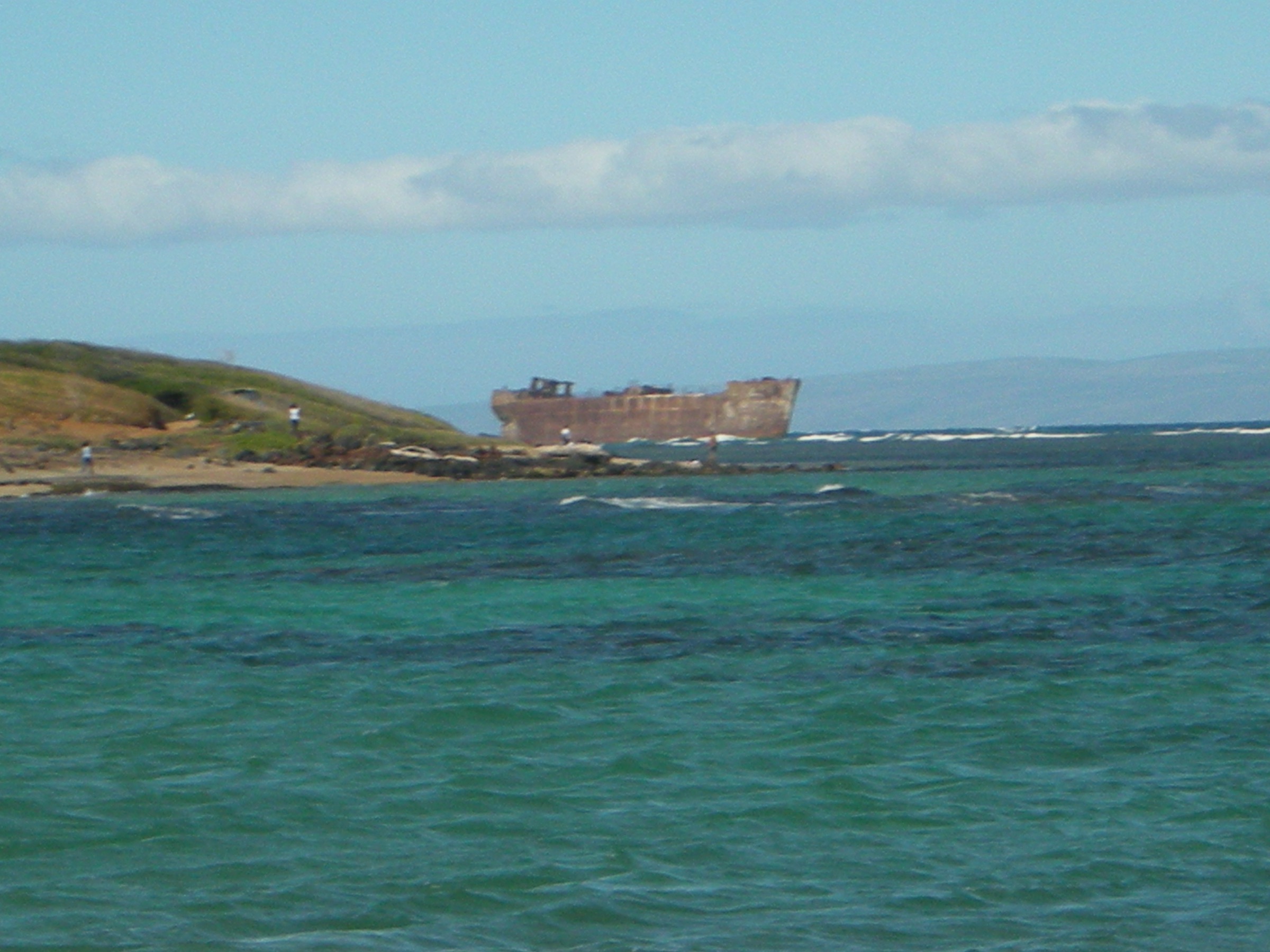 Rusted freighter grounded on the reef off Kaiolohia (Shipwreck Beach), Lānaʻi north shore