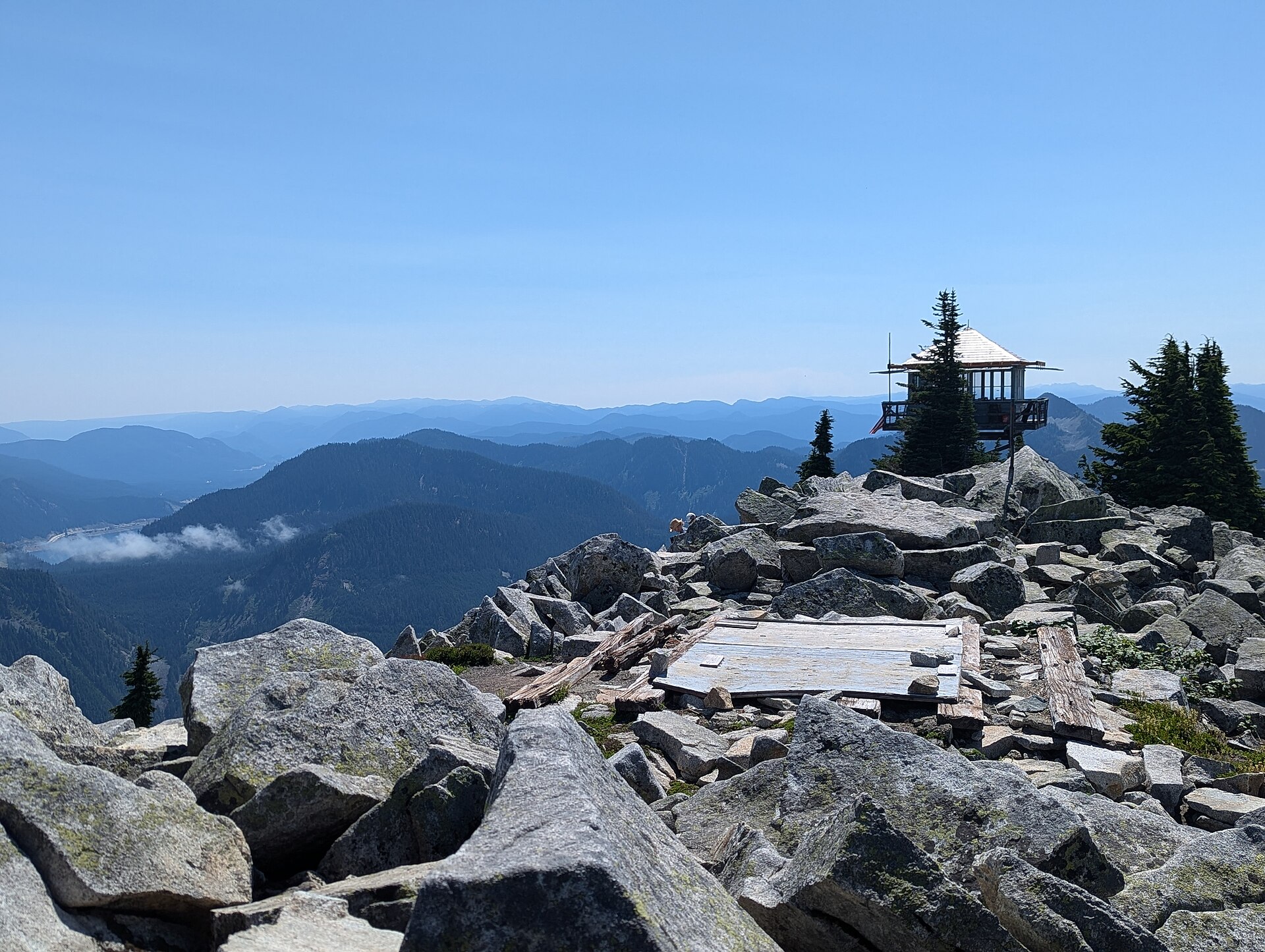 The Granite Mountain fire lookout on its rocky summit in the Alpine Lakes Wilderness
