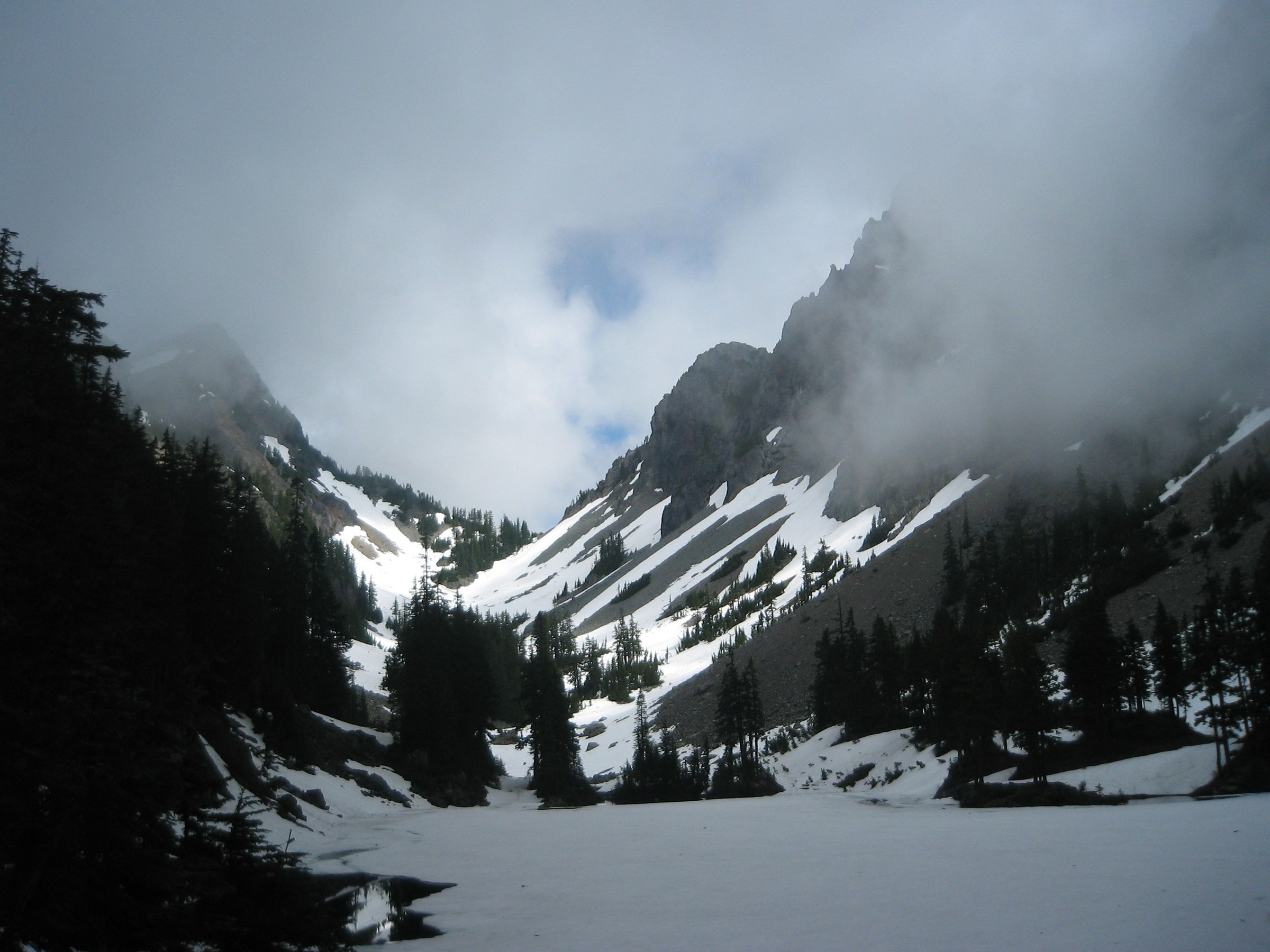 Melakwa Lake in its rock basin beneath Kaleetan Peak and Chair Peak, Alpine Lakes Wilderness