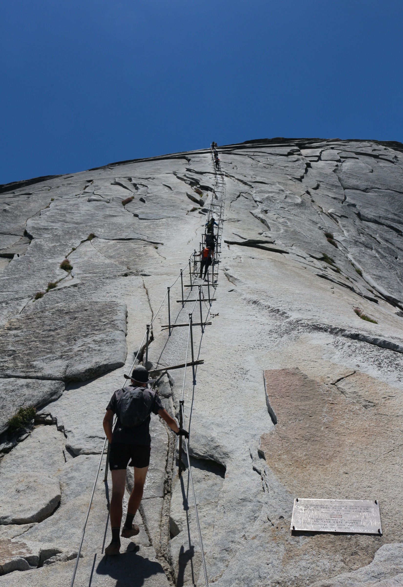 Hikers approaching the summit of Half Dome, Yosemite National Park