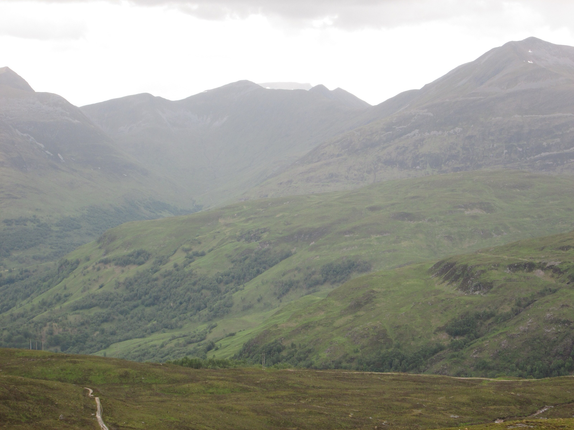 Walker descending the Devil's Staircase on the West Highland Way near Kinlochleven