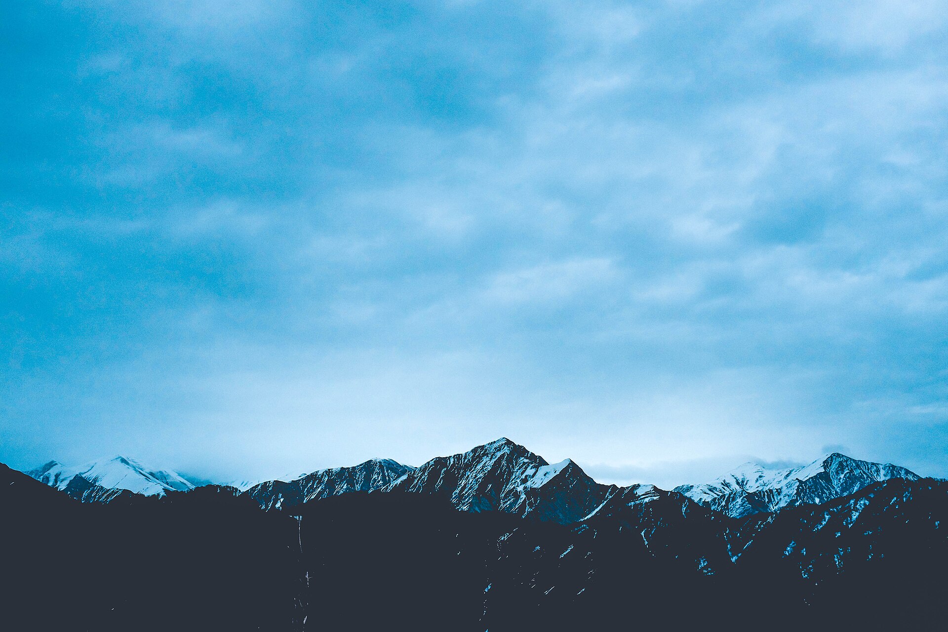 The long rocky skyline of Tufandag beneath blue-grey cloud