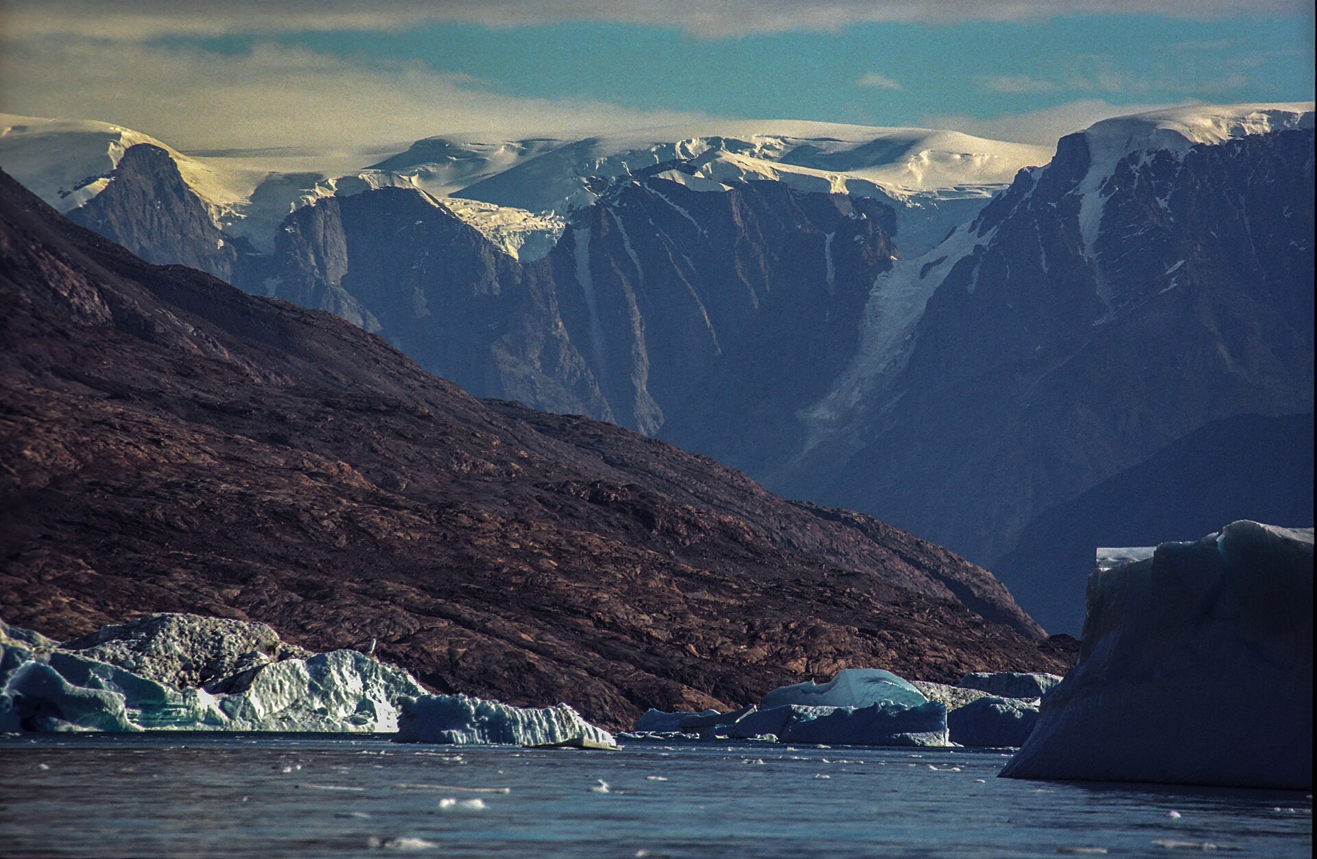 Sharp snow-streaked peaks and glaciers in the Stauning Alps of East Greenland