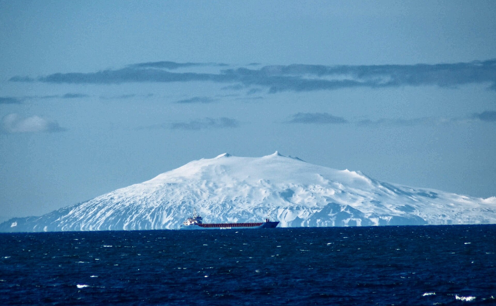 The snow-covered Snæfellsjökull volcano seen across the sea