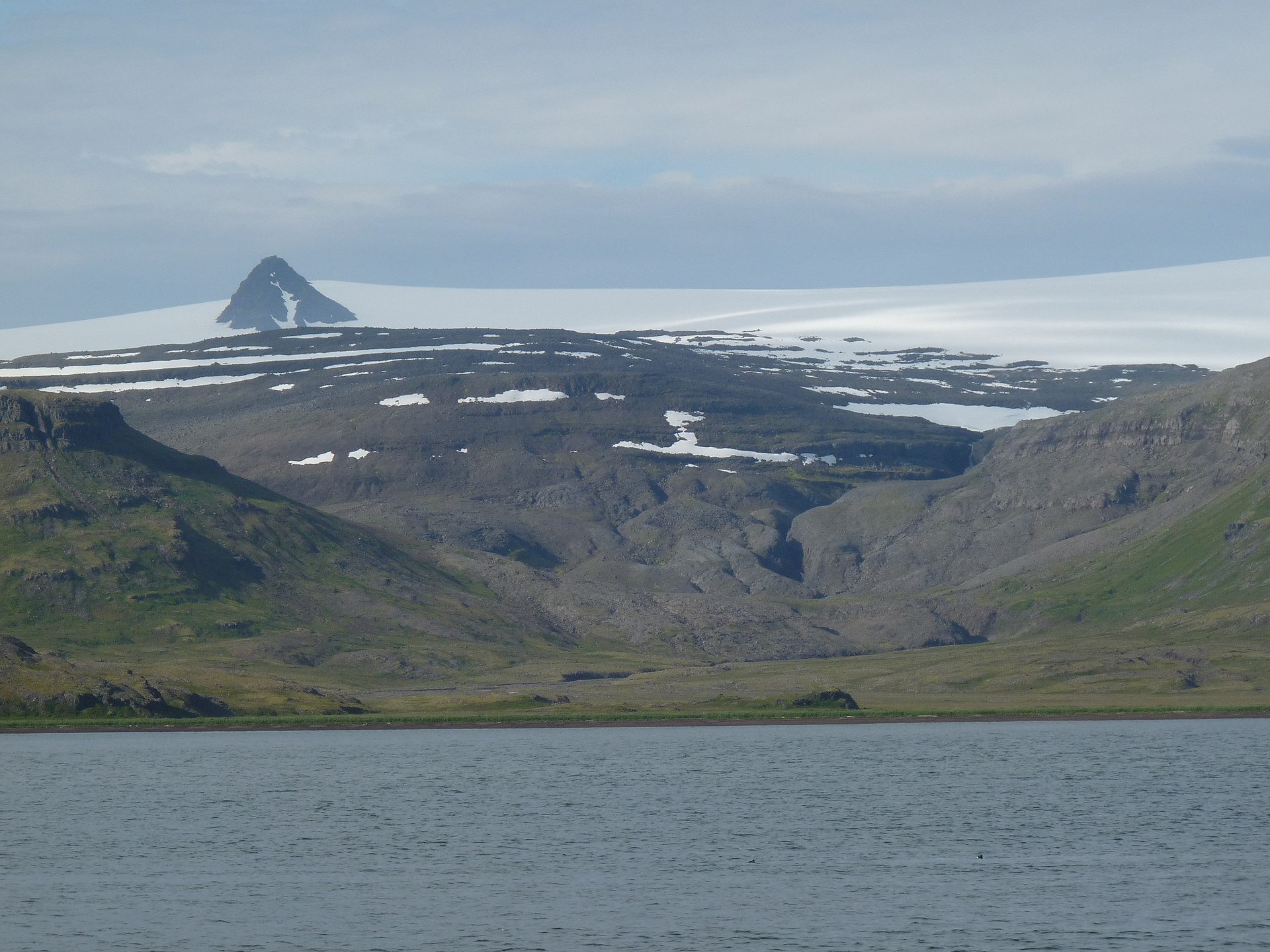 Þaralátursfjörður with the white Drangajökull ice cap behind
