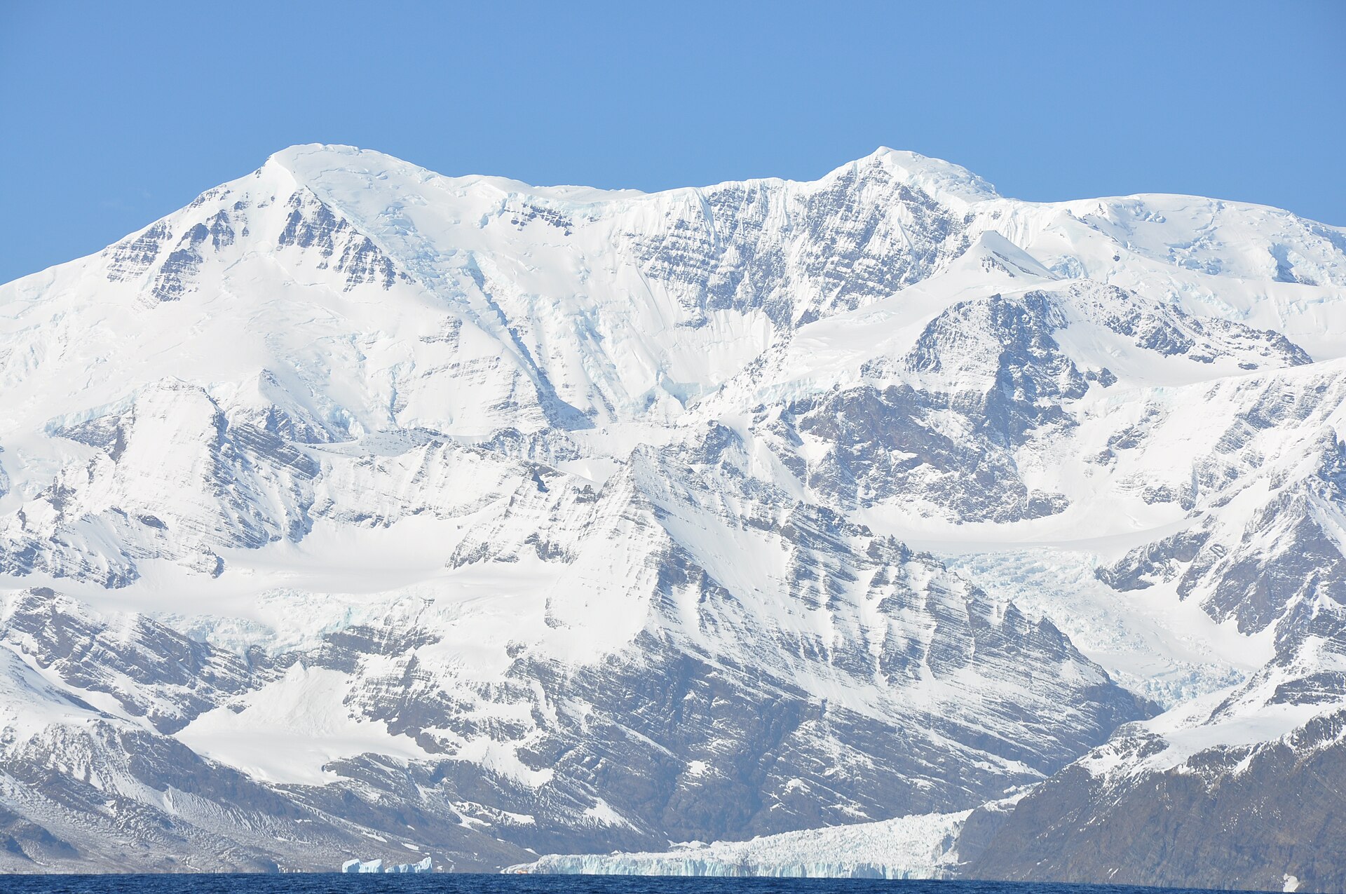 The broad snow-covered summit slopes of Mount Paget in South Georgia