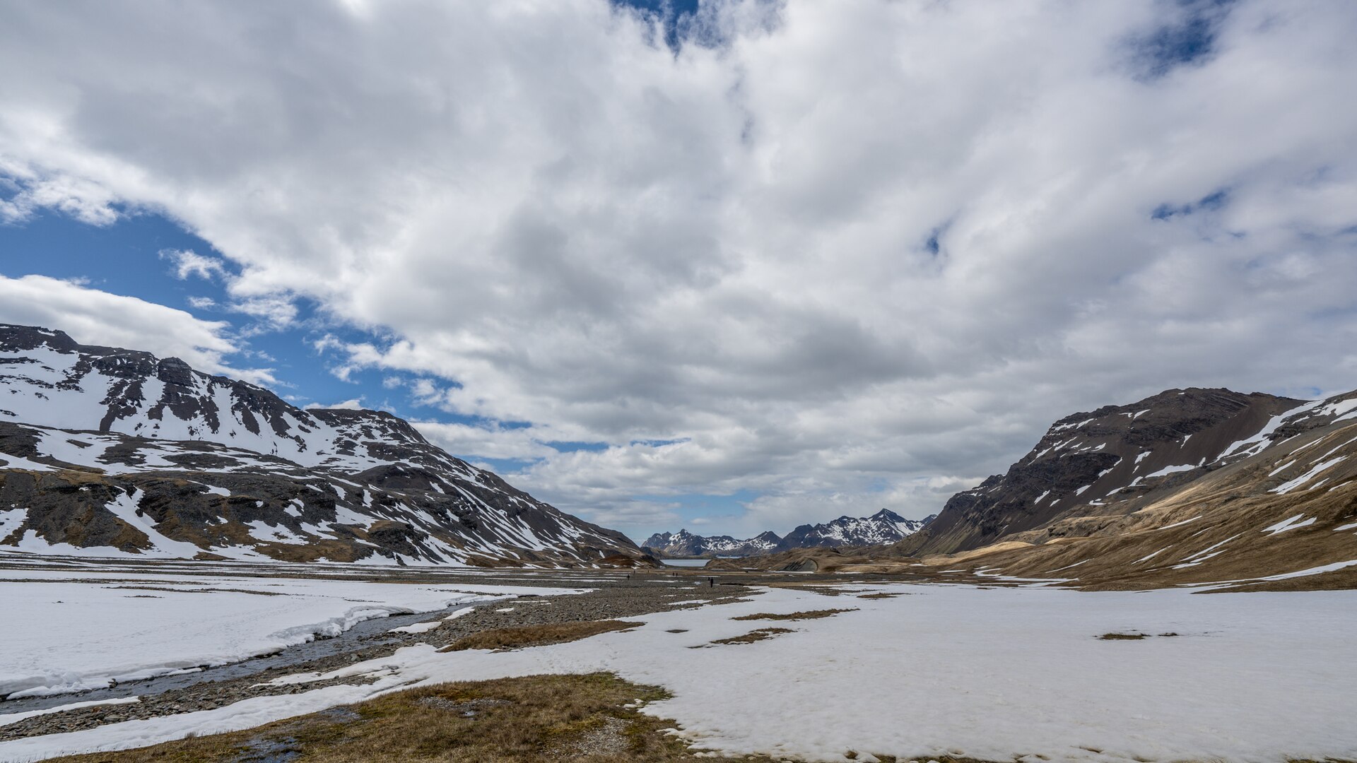 Snow patches and cloud along Shackleton Valley above Stromness