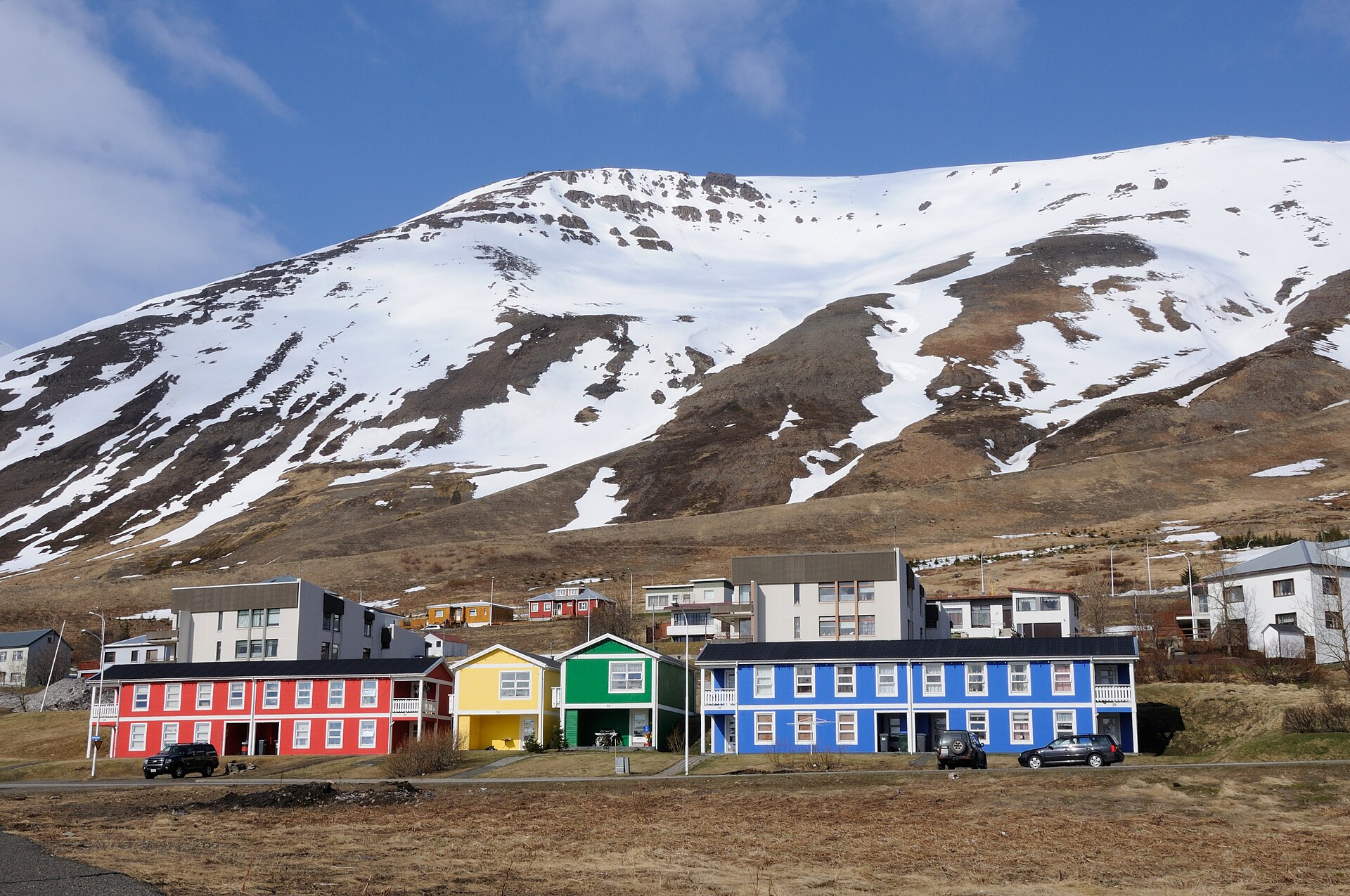 Colourful houses beneath the snow-covered slopes of Siglufjörður
