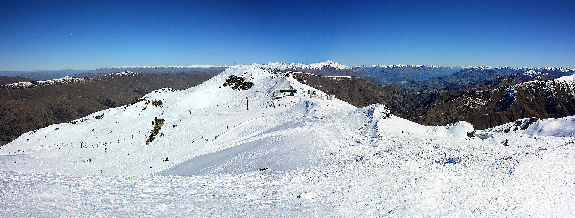 Snow-covered Captains Basin at Cardrona with ranges on the horizon