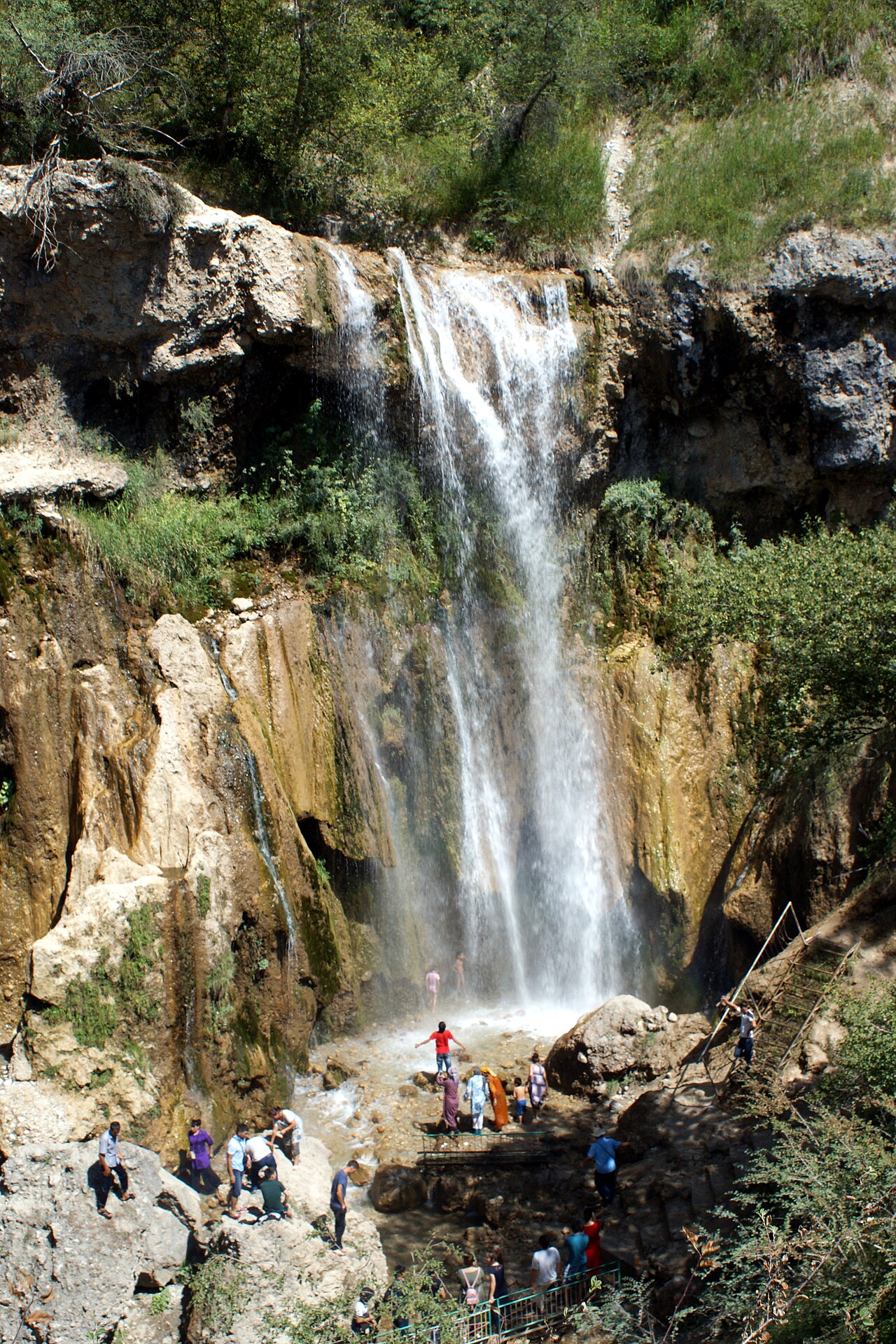 The small waterfall at Arslanbob dropping into a wooded gorge