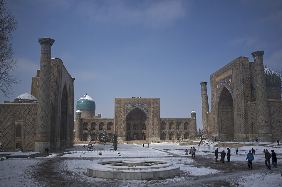 The tiled madrasas of Samarkand's Registan under winter snow