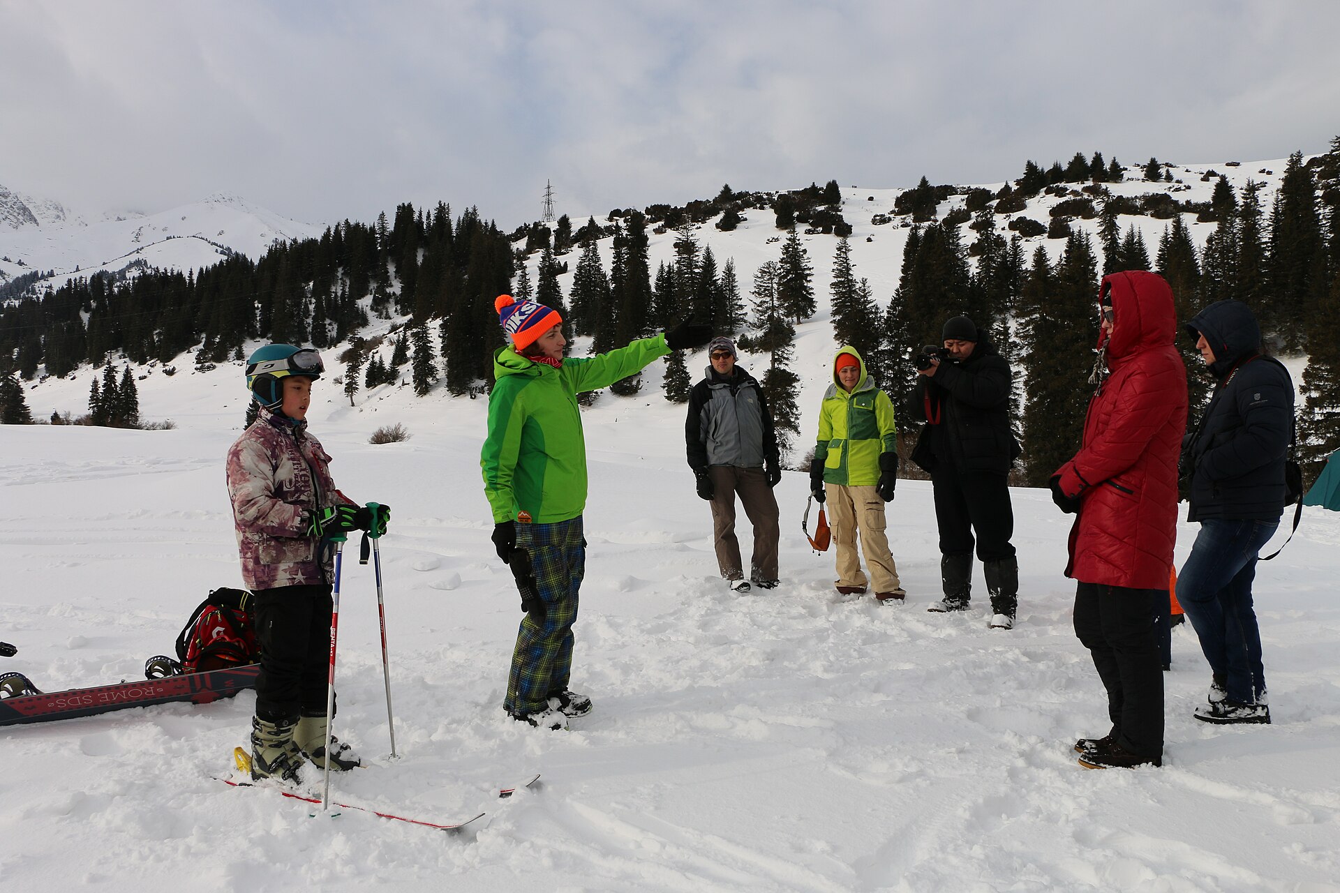Ski tourers practising avalanche rescue in the snow at Jyrgalan