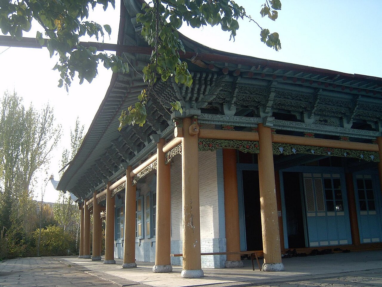The brightly painted timber exterior of Karakol's Dungan Mosque