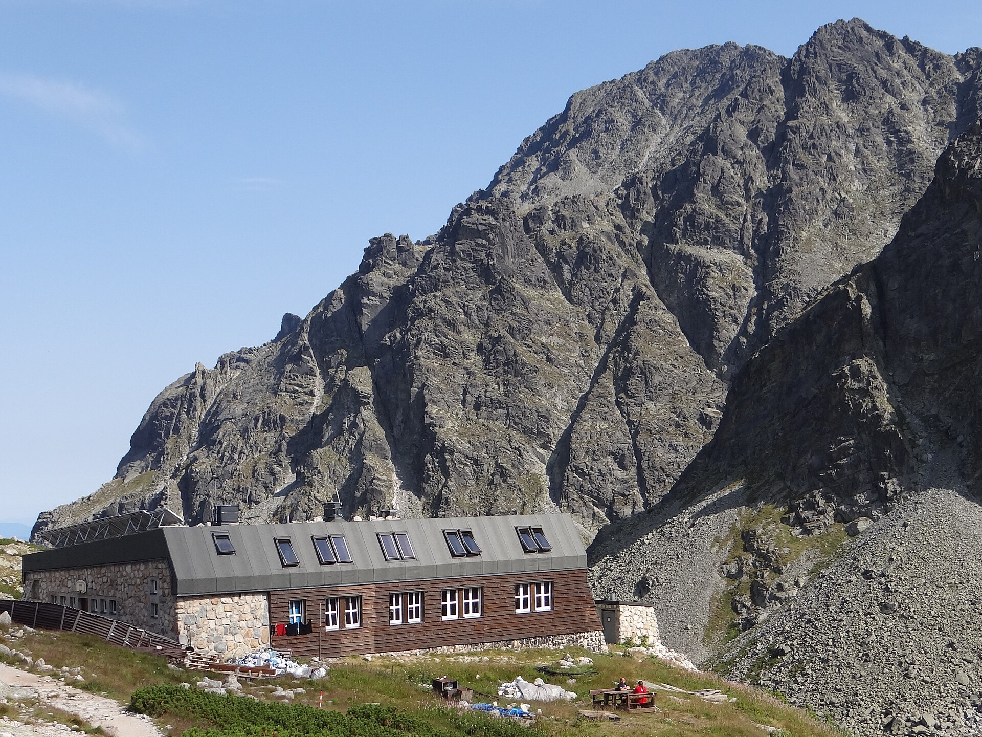 Zbojnícka Chata set beneath steep granite walls