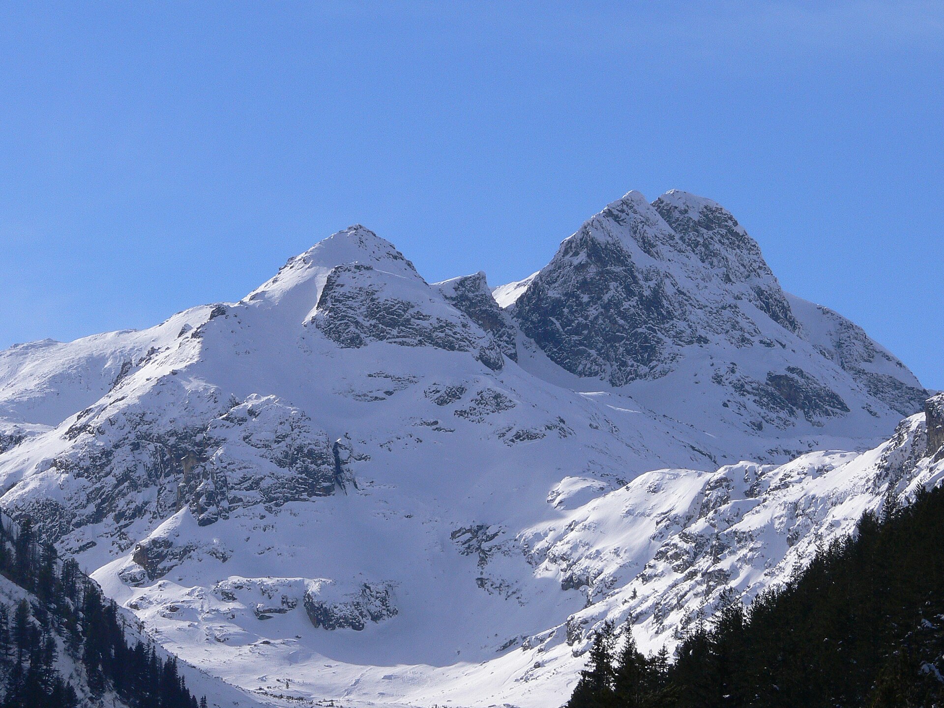 The snow-covered double summit of Malyovitsa