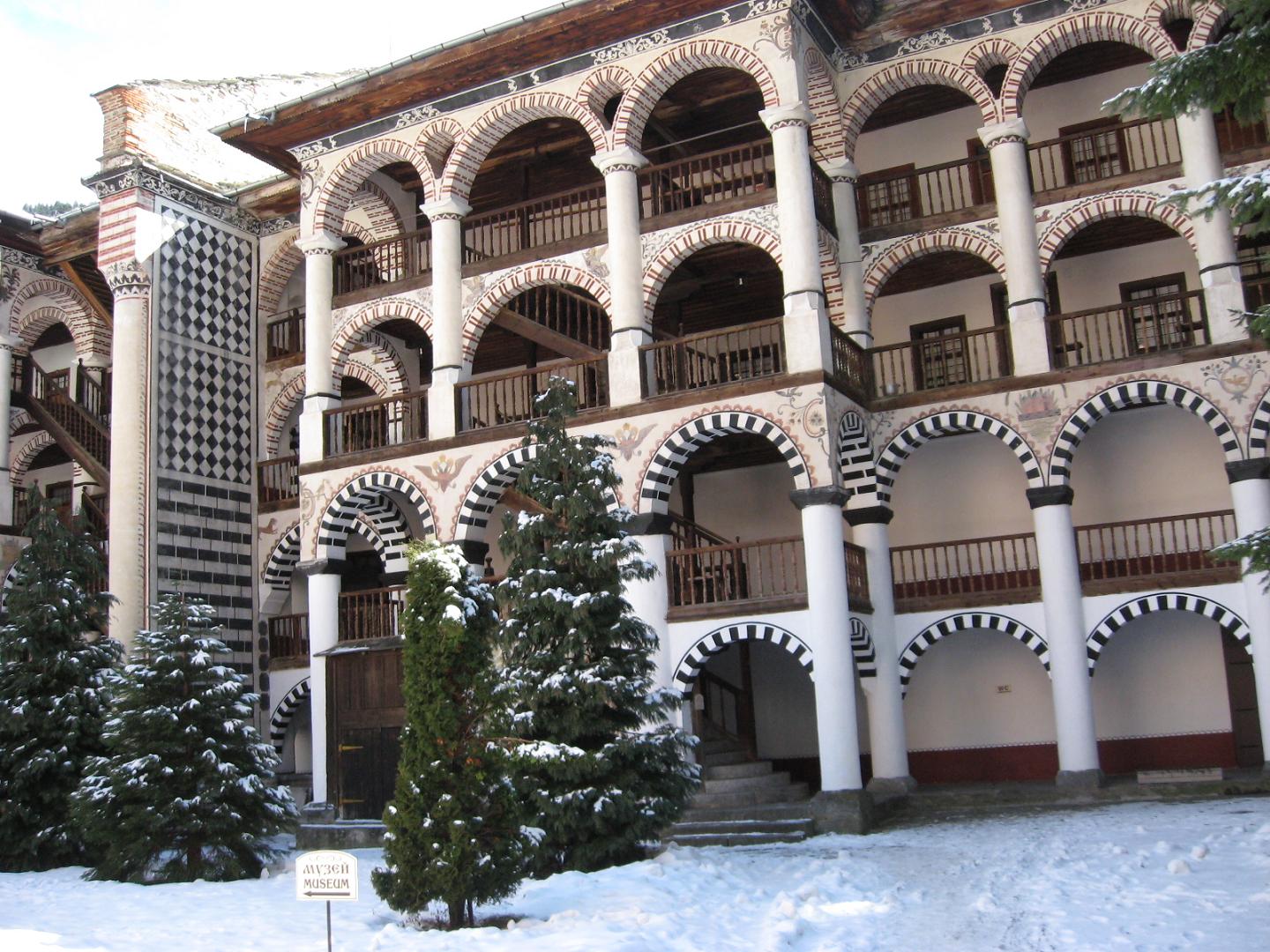 Snow in the arcaded courtyard of Rila Monastery