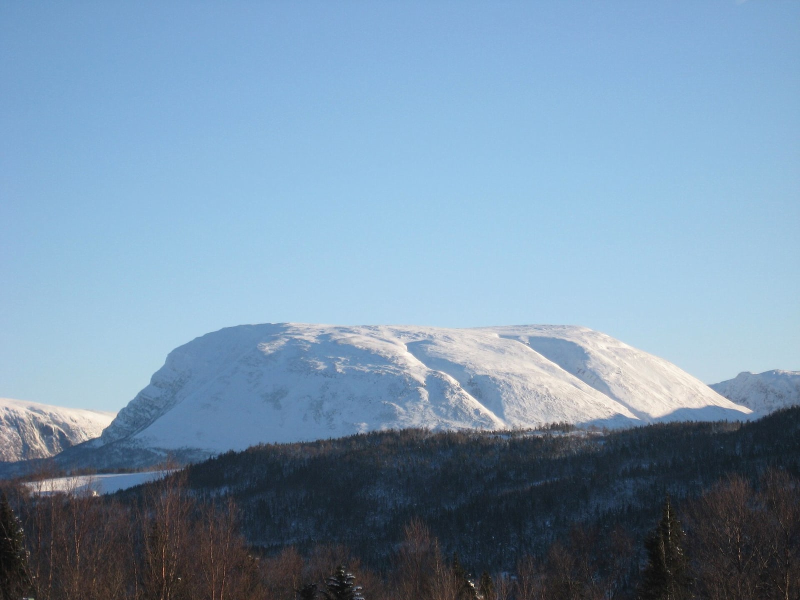 Gros Morne Mountain rising above a snow-covered Newfoundland landscape