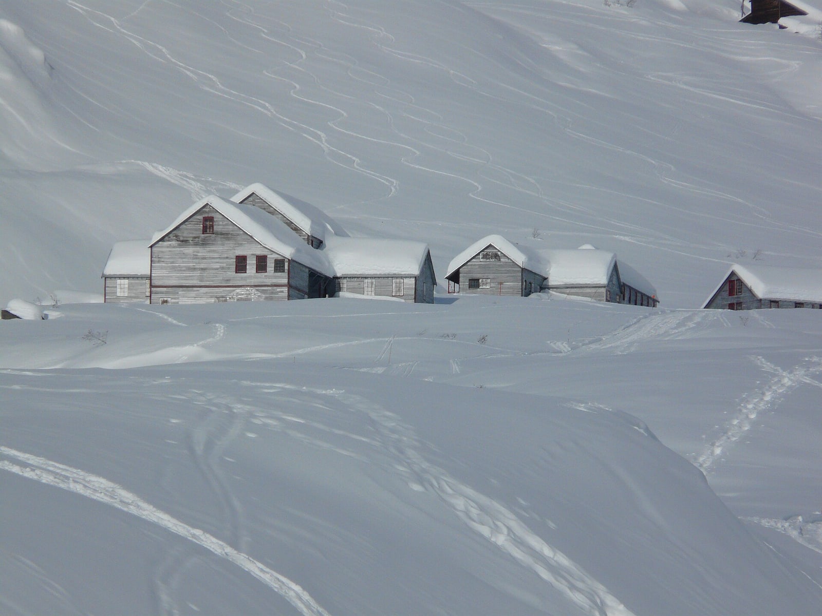 Rounded snowy mountains and road terrain at Hatcher Pass