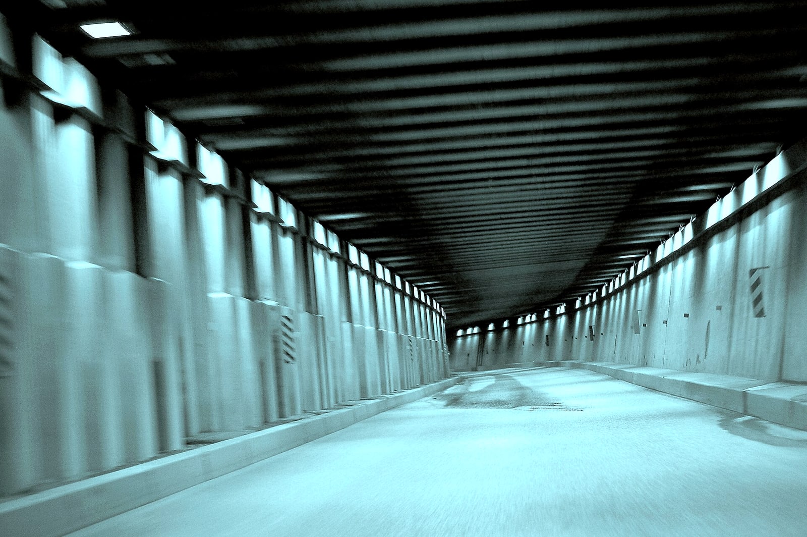 A highway snowshed beneath steep avalanche paths at Rogers Pass