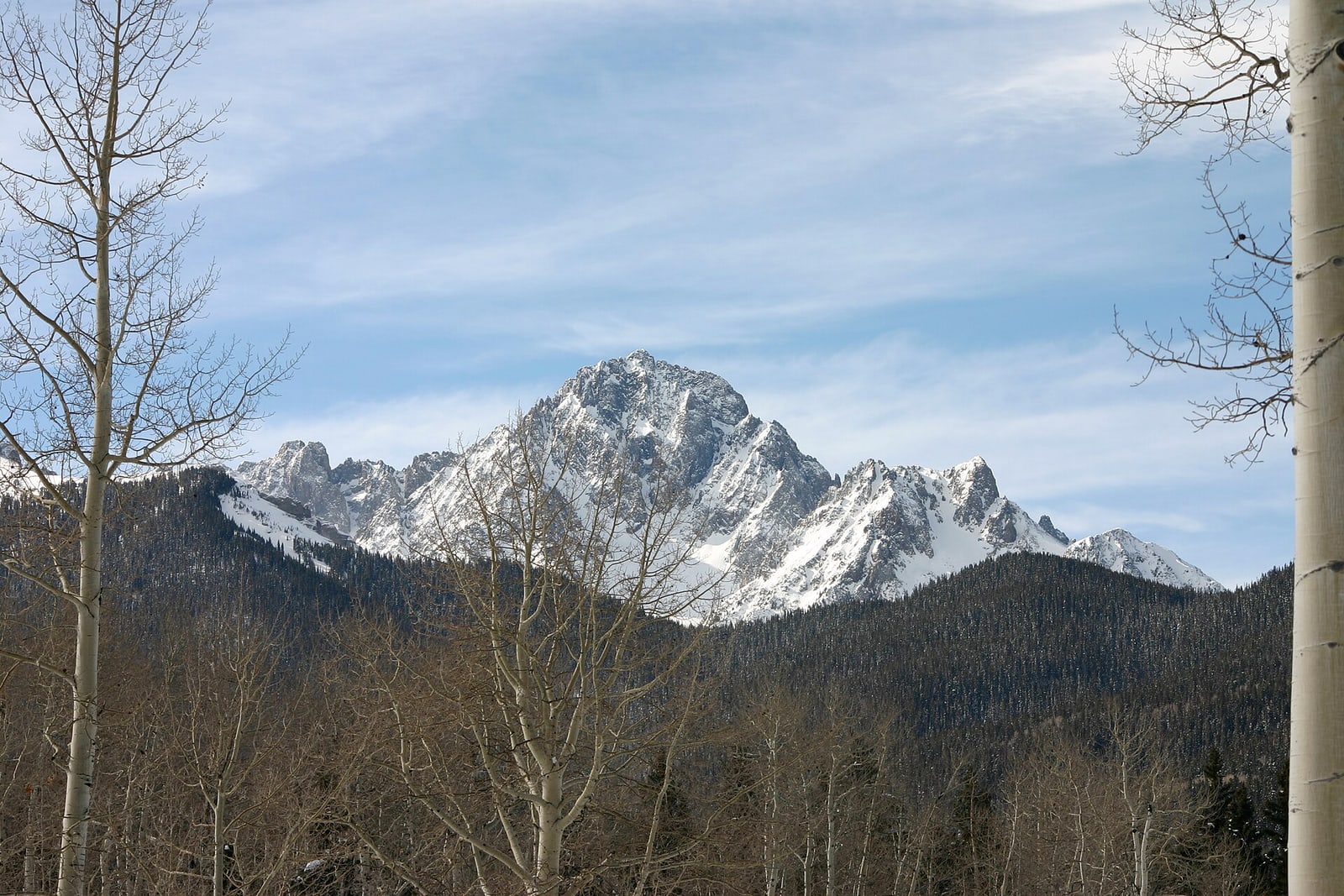 Snow-covered Mount Sneffels rising above the San Juan Mountains