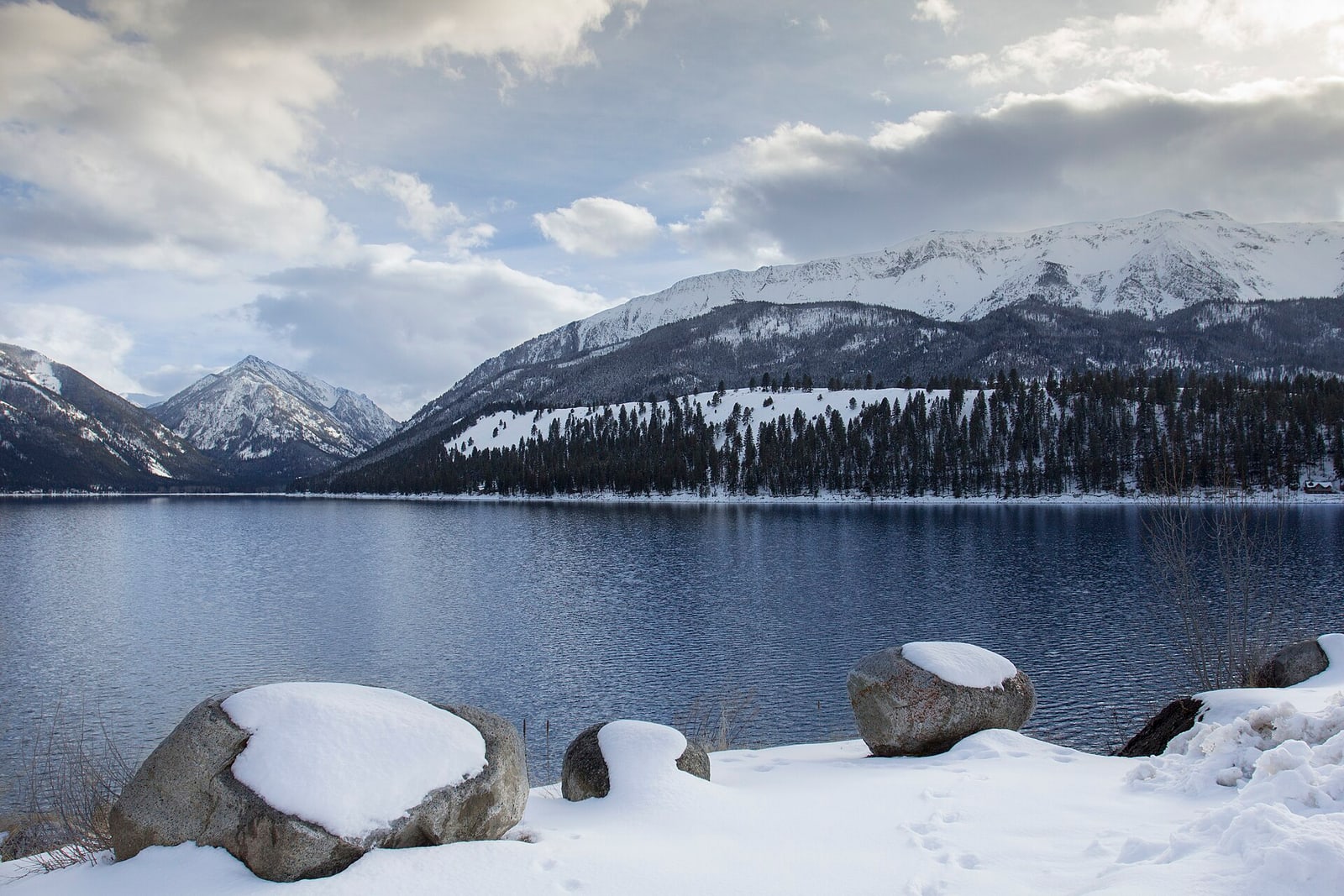 Wallowa Lake and surrounding mountains in winter