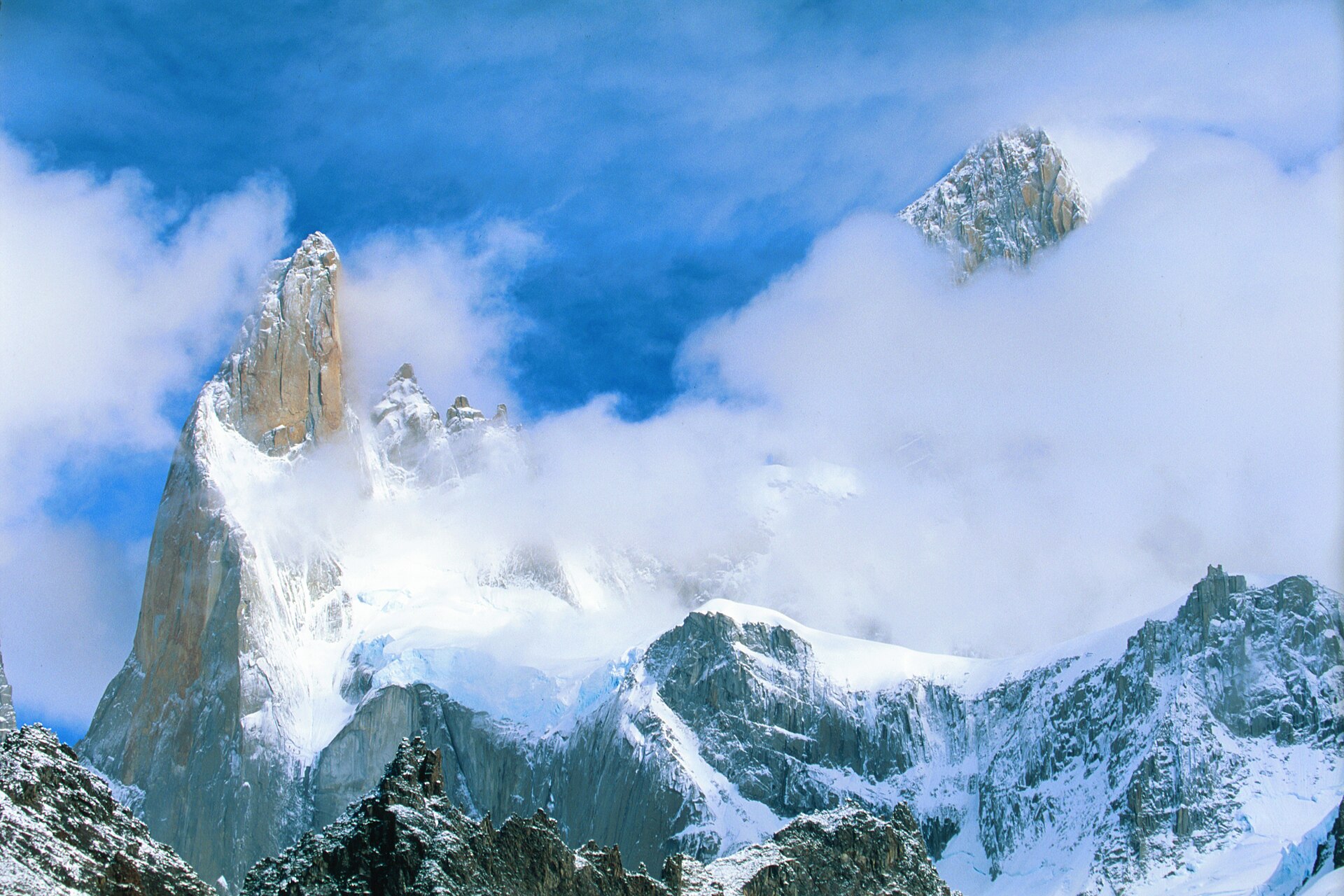 Fitz Roy emerging through cloud after fresh snow