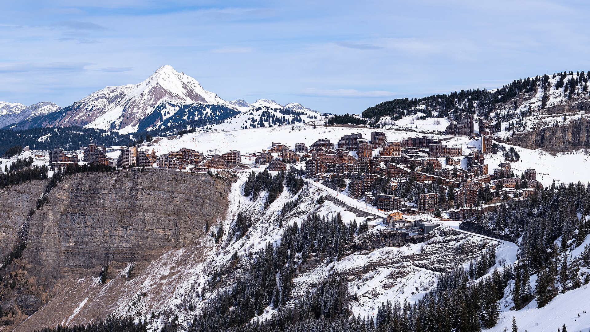 The snow-covered resort of Avoriaz under a pale winter sky